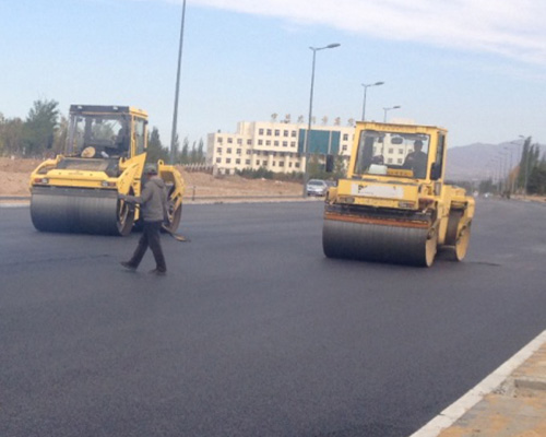 Asphalt-concrete road reinforcement